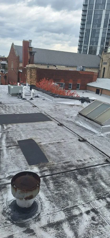 Slide of Guaranteed Roofing & Tuckpointing