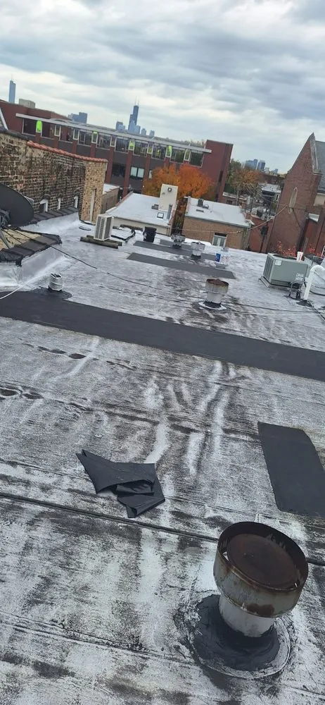 Slide of Guaranteed Roofing & Tuckpointing