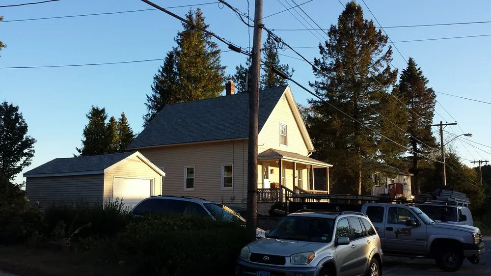 Slide of Guaranteed Roofing