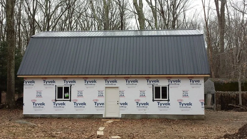 Slide of Guaranteed Roofing