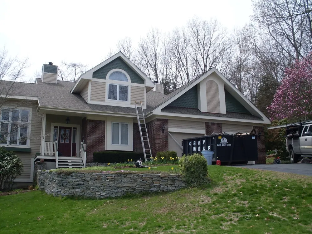 Slide of Guaranteed Roofing