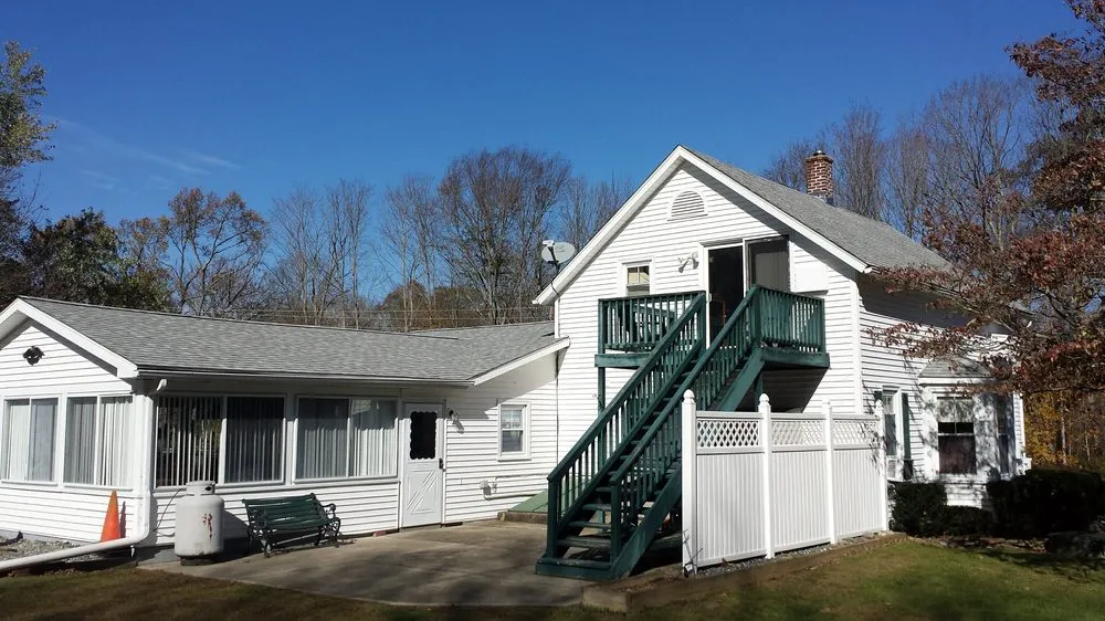 Slide of Guaranteed Roofing