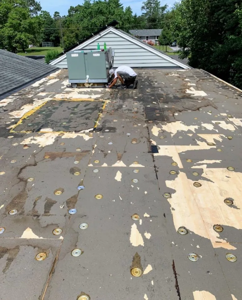 Slide of Guaranteed Roofing