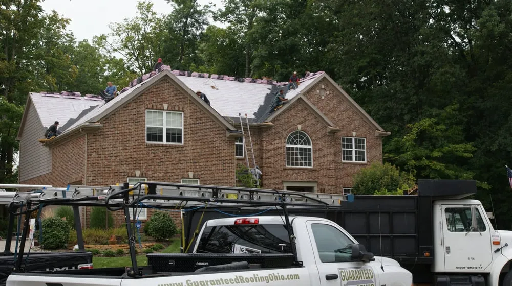 Slide of Guaranteed Roofing