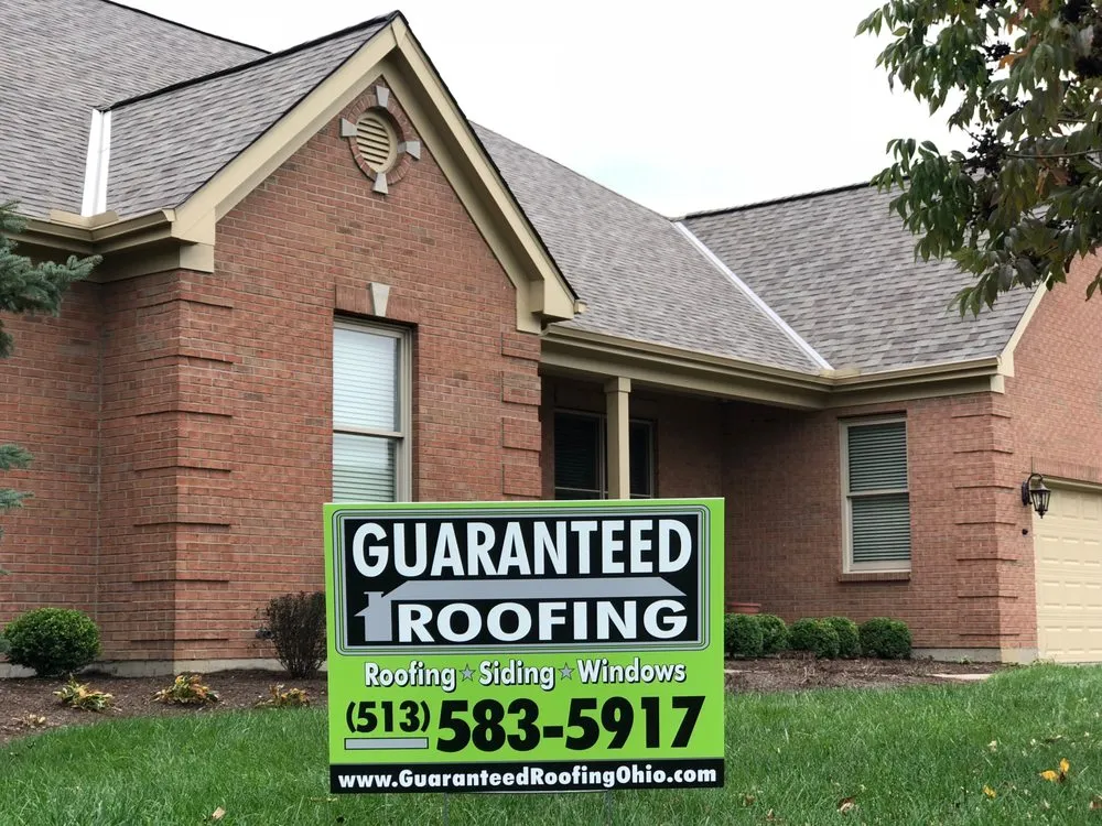 Slide of Guaranteed Roofing