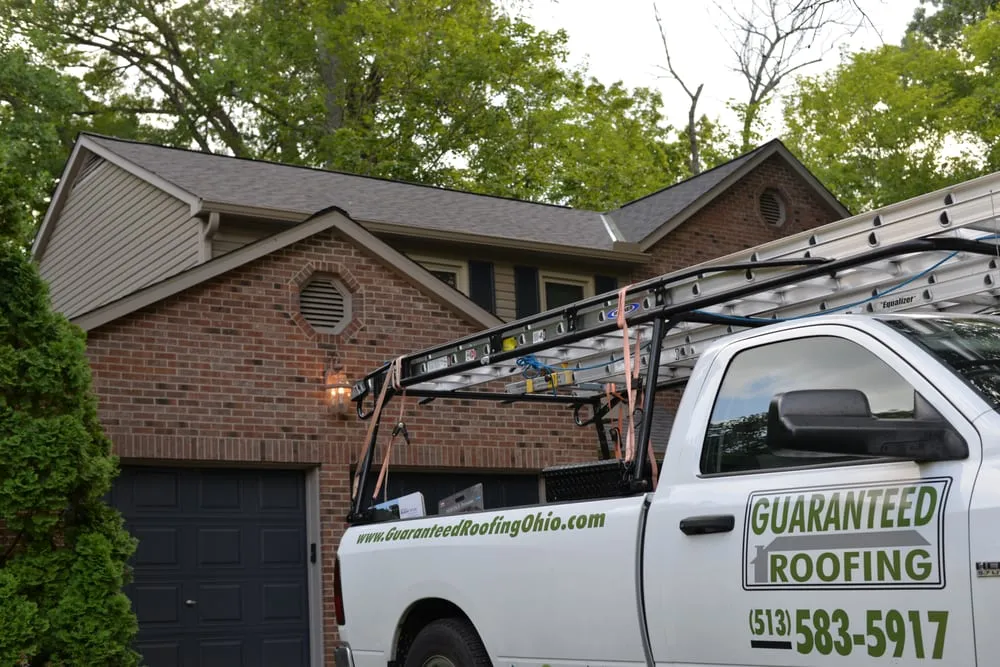 Slide of Guaranteed Roofing