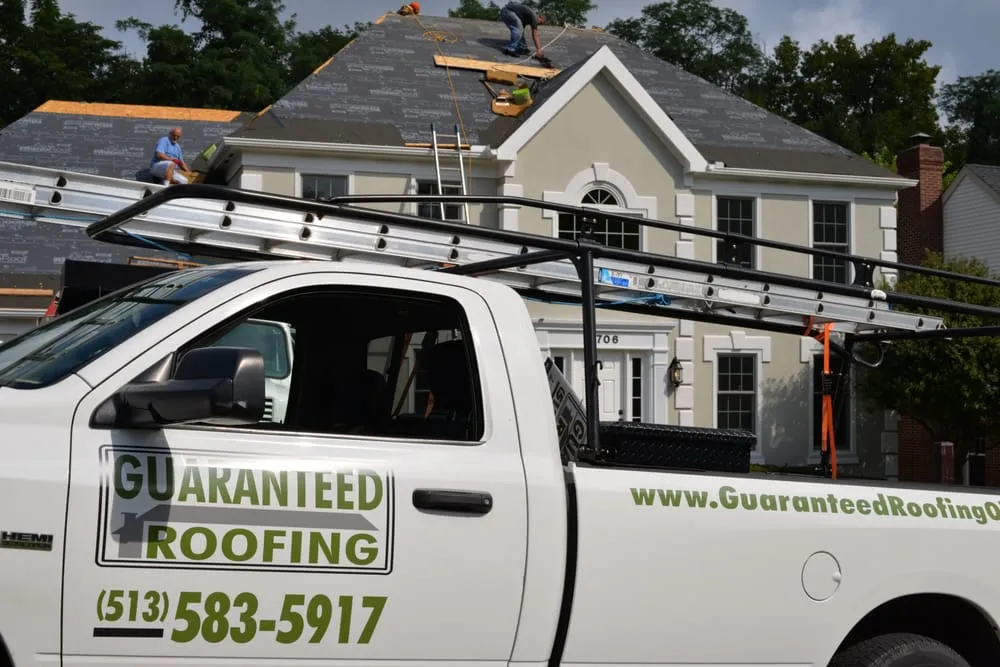 Slide of Guaranteed Roofing