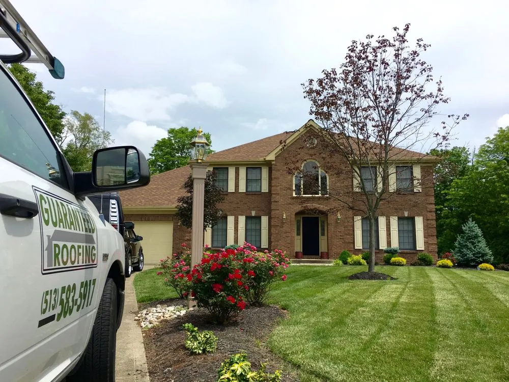 Slide of Guaranteed Roofing