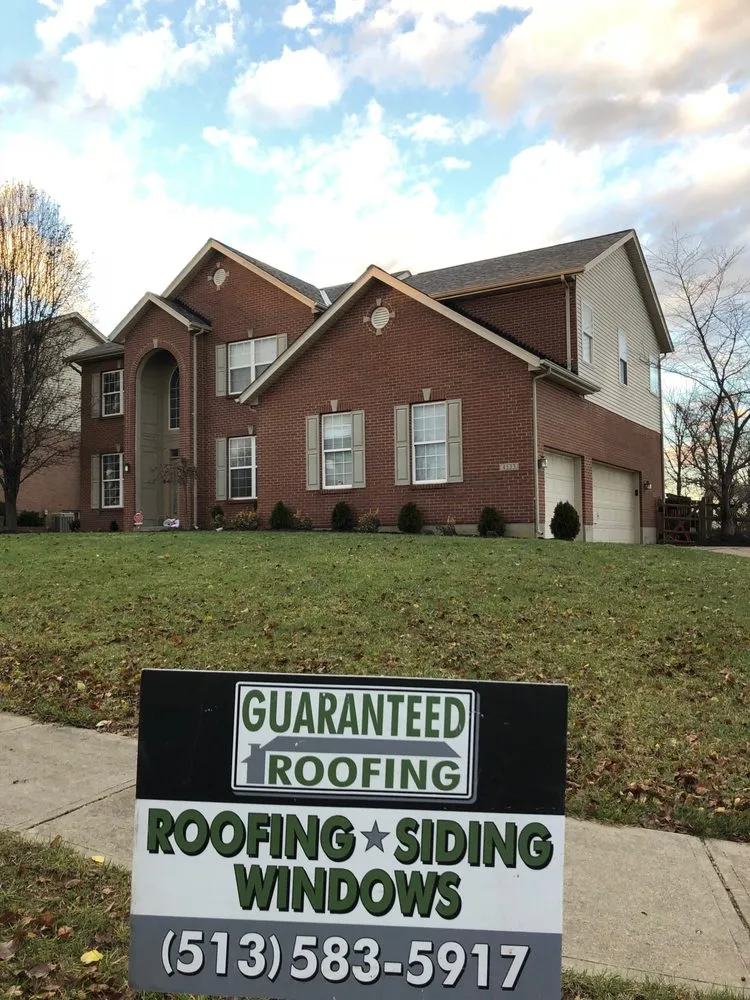 Slide of Guaranteed Roofing