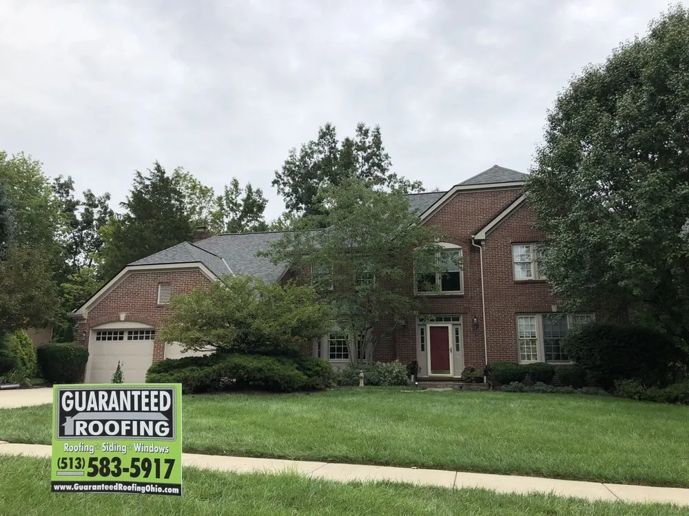 Slide of Guaranteed Roofing