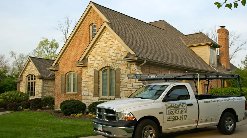 Slide of Guaranteed Roofing