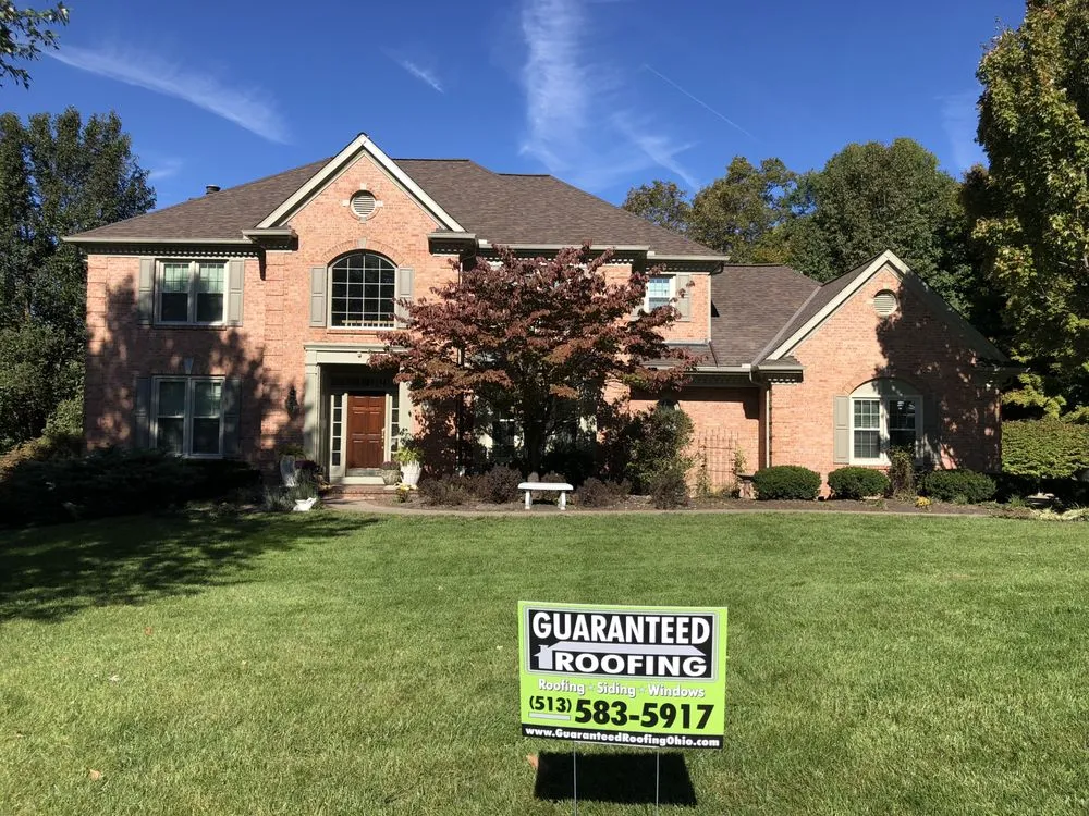 Slide of Guaranteed Roofing