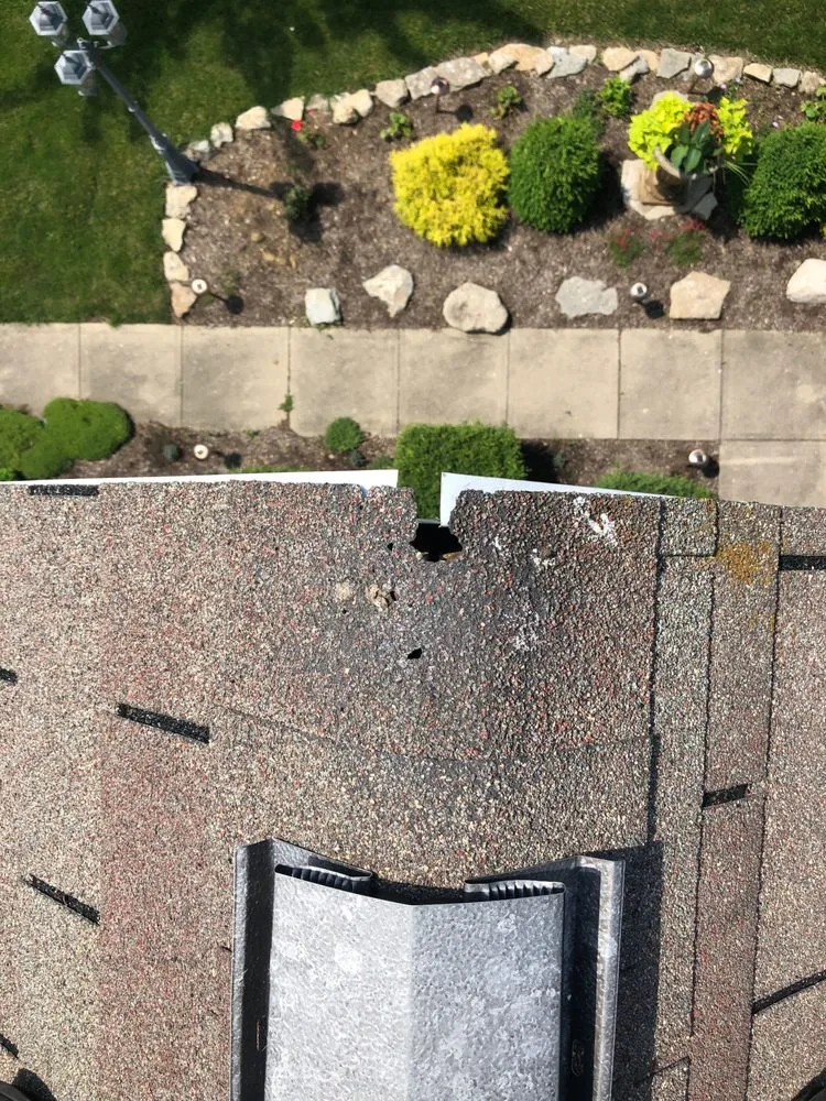 Slide of Guaranteed Roofing