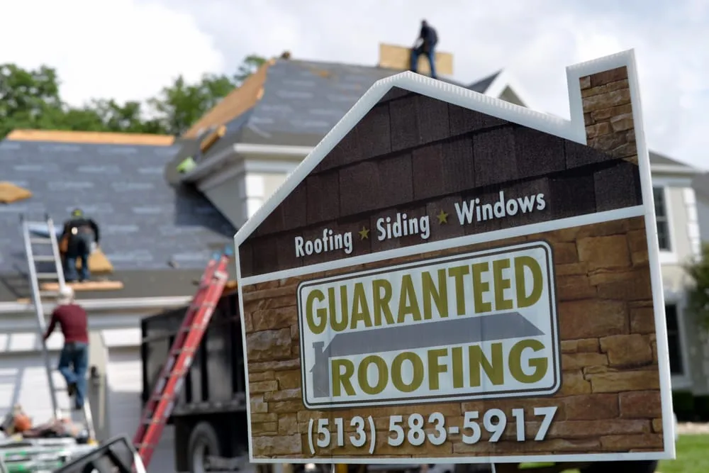 Slide of Guaranteed Roofing