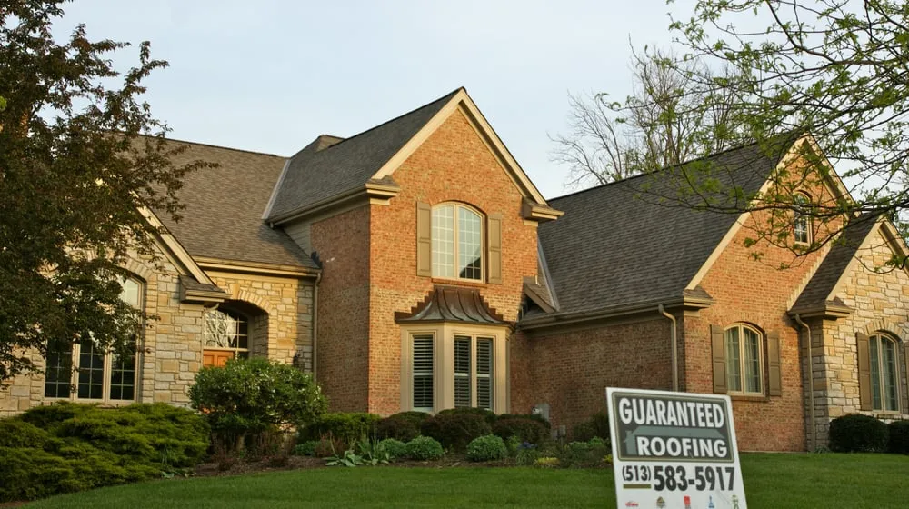 Slide of Guaranteed Roofing