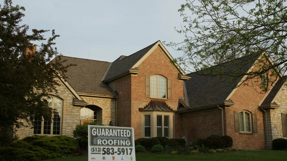 Slide of Guaranteed Roofing