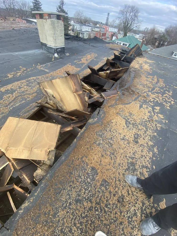 Slide of Guaranteed Roofing