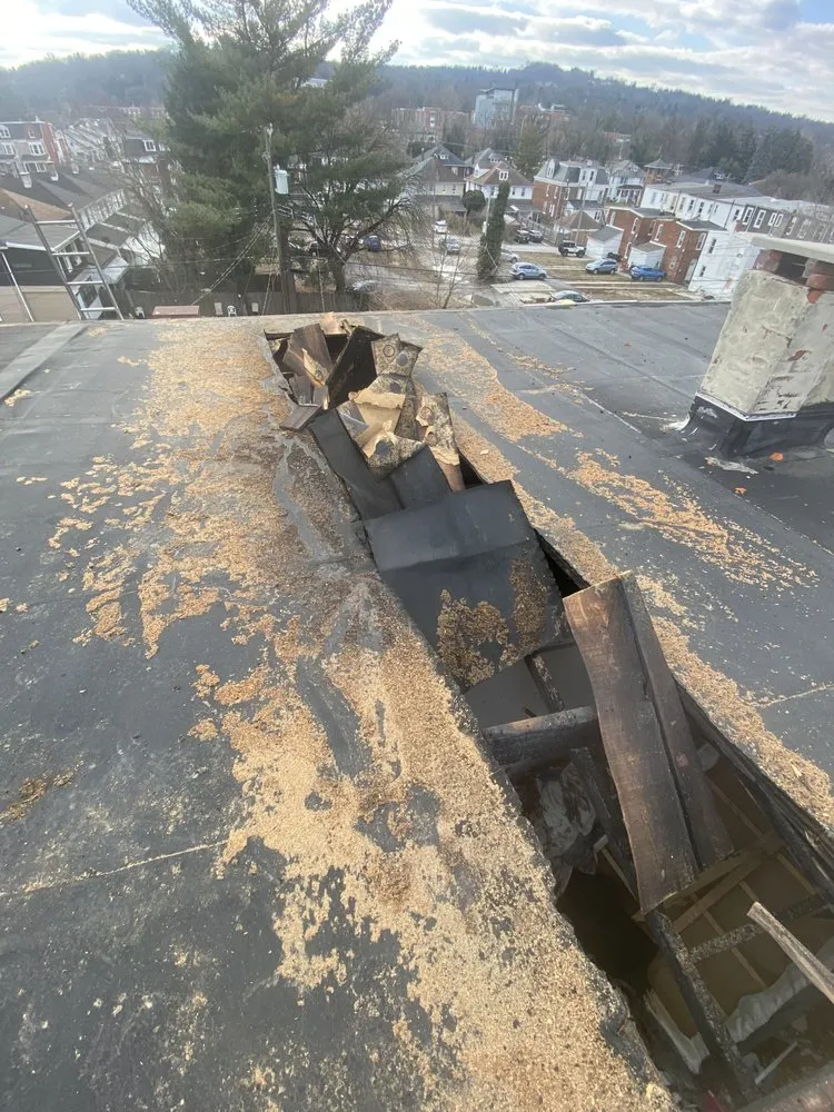 Slide of Guaranteed Roofing