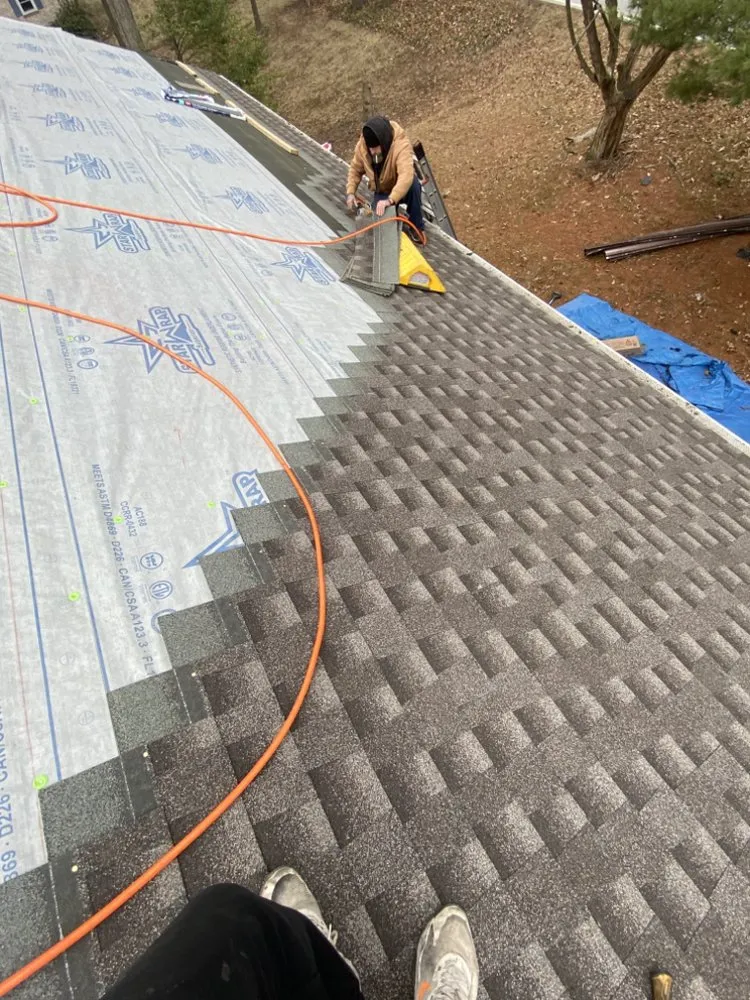 Slide of Guaranteed Roofing