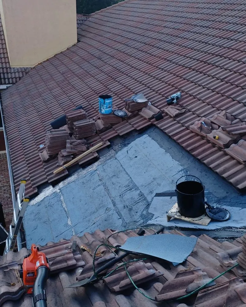 Slide of Guaranteed Roofing Solutions