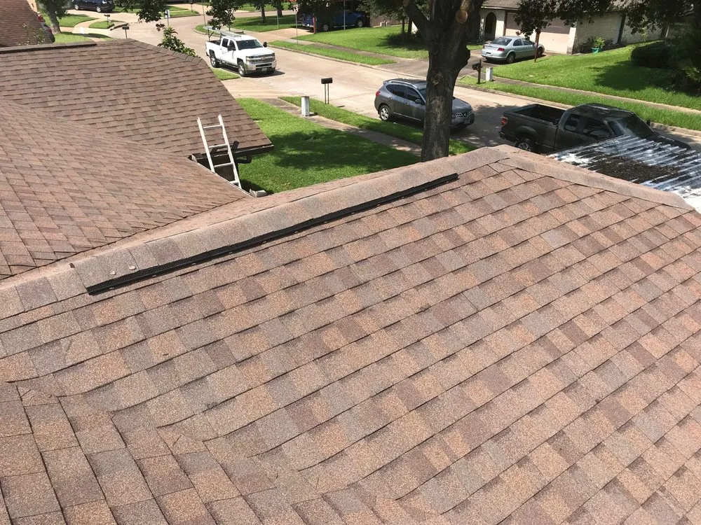 Slide of Guardian Roofing