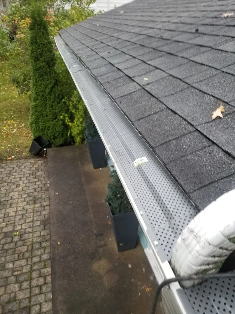 Slide of Guardian Shutters & Gutter Guards