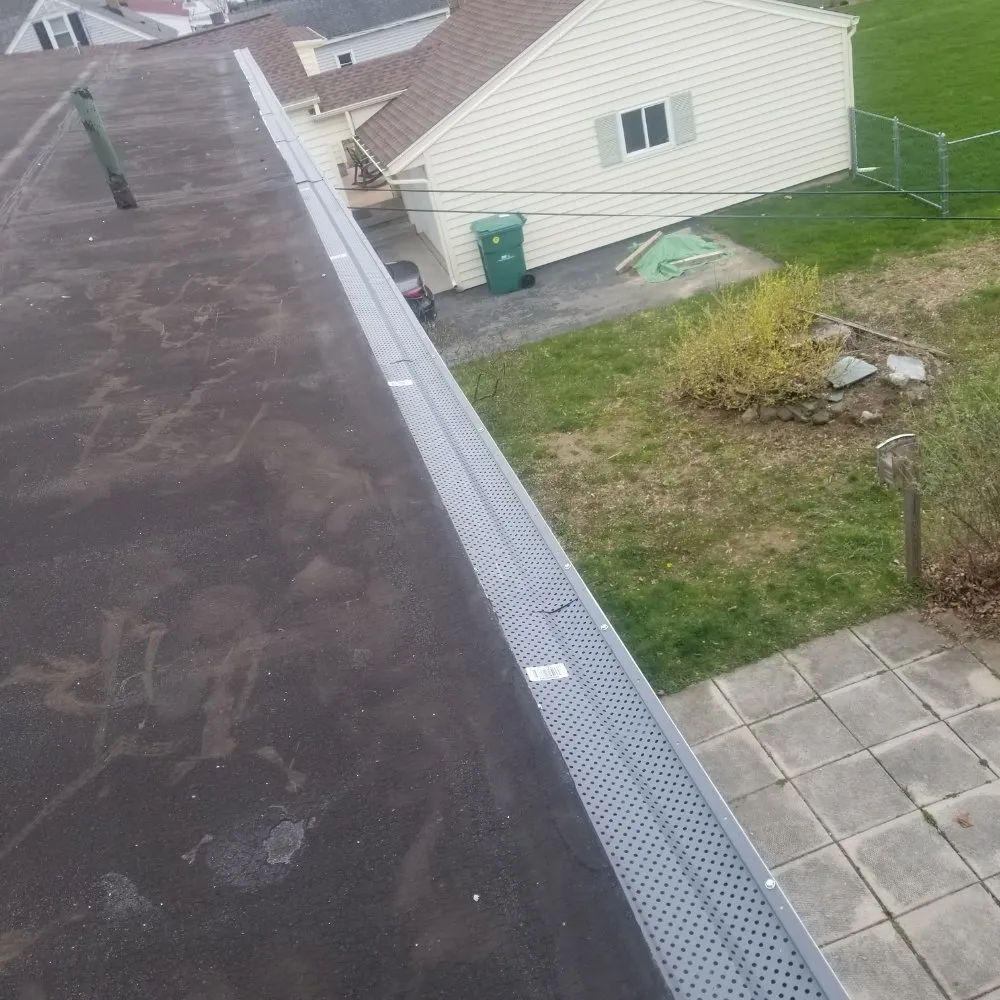 Slide of Guardian Shutters & Gutter Guards