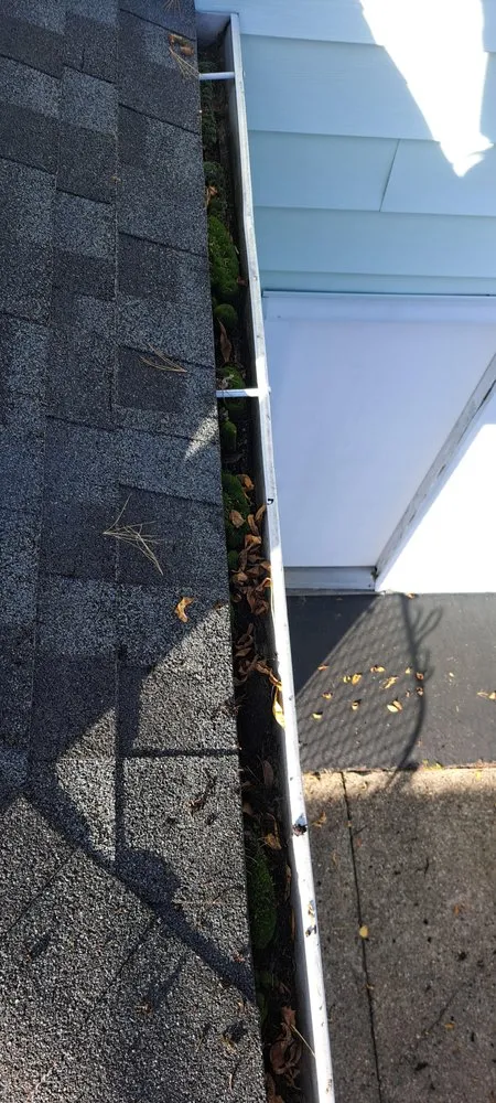 Slide of Guardian Shutters & Gutter Guards