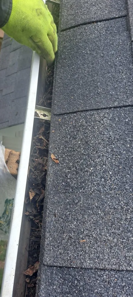 Slide of Guardian Shutters & Gutter Guards