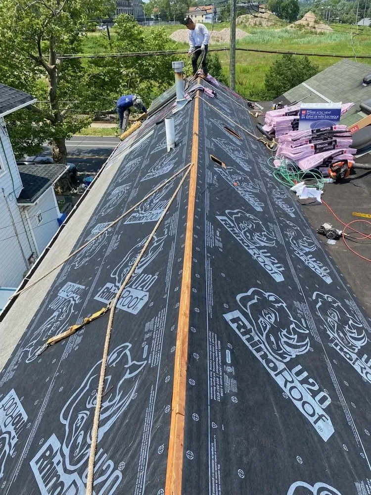 Slide of Guasco's Roofing