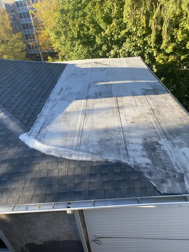 Slide of Guasco's Roofing