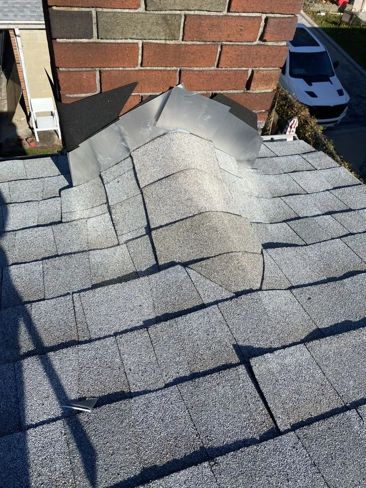 Slide of Guasco's Roofing