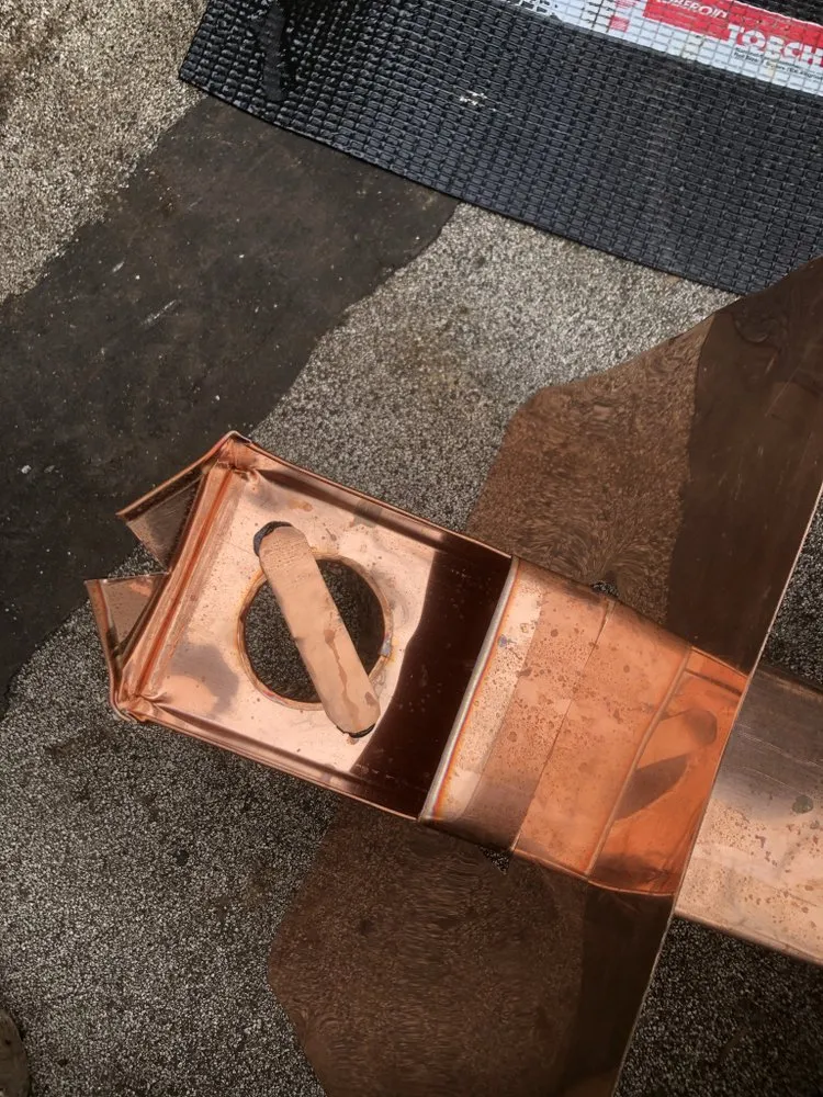 Slide of Gucci Roofing