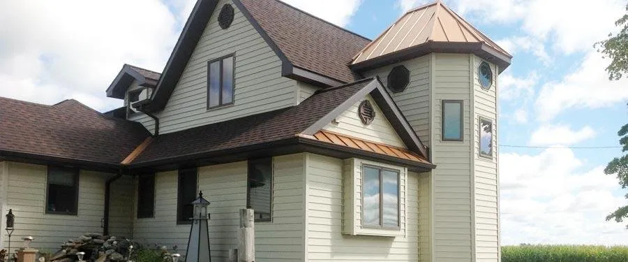 Expert flat roof repair for homes in Mulliken, MI by Guilfords Construction & Seamless Gutters