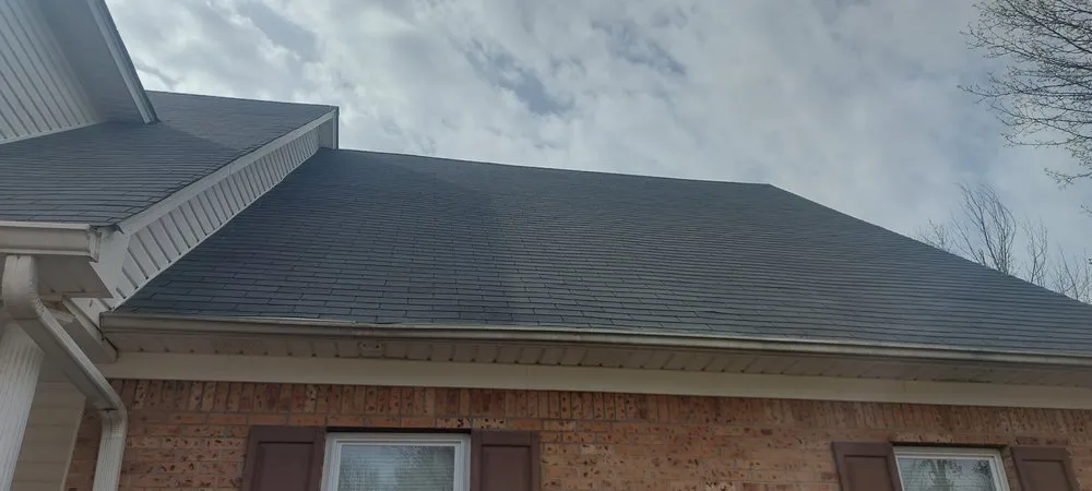 Slide of Guisan Roofing