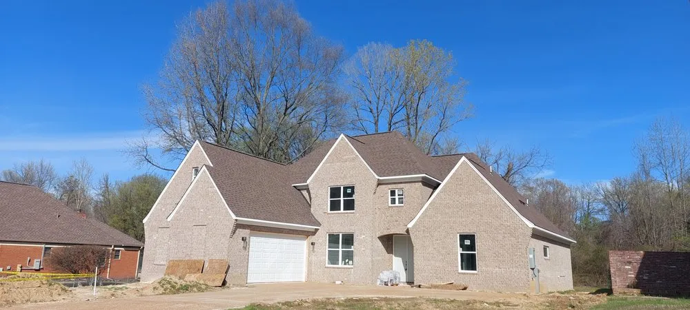 Slide of Guisan Roofing