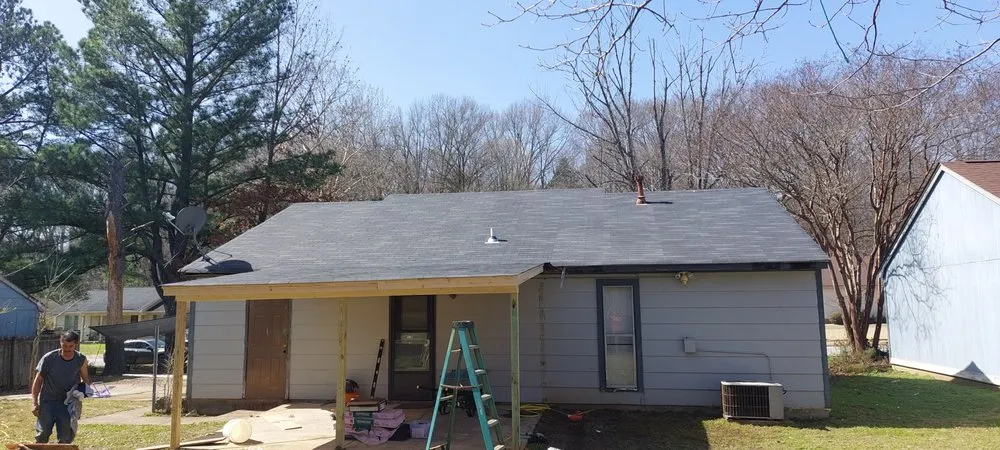 Slide of Guisan Roofing