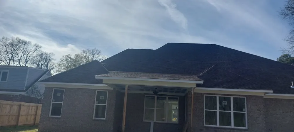 Slide of Guisan Roofing