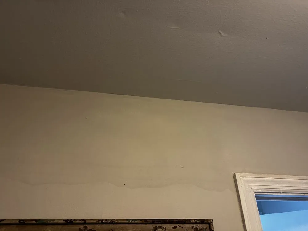 Slide of Gulliver Roofing