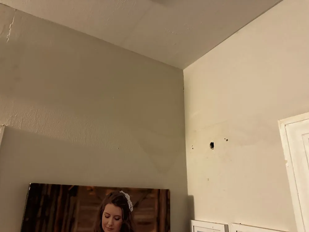 Slide of Gulliver Roofing