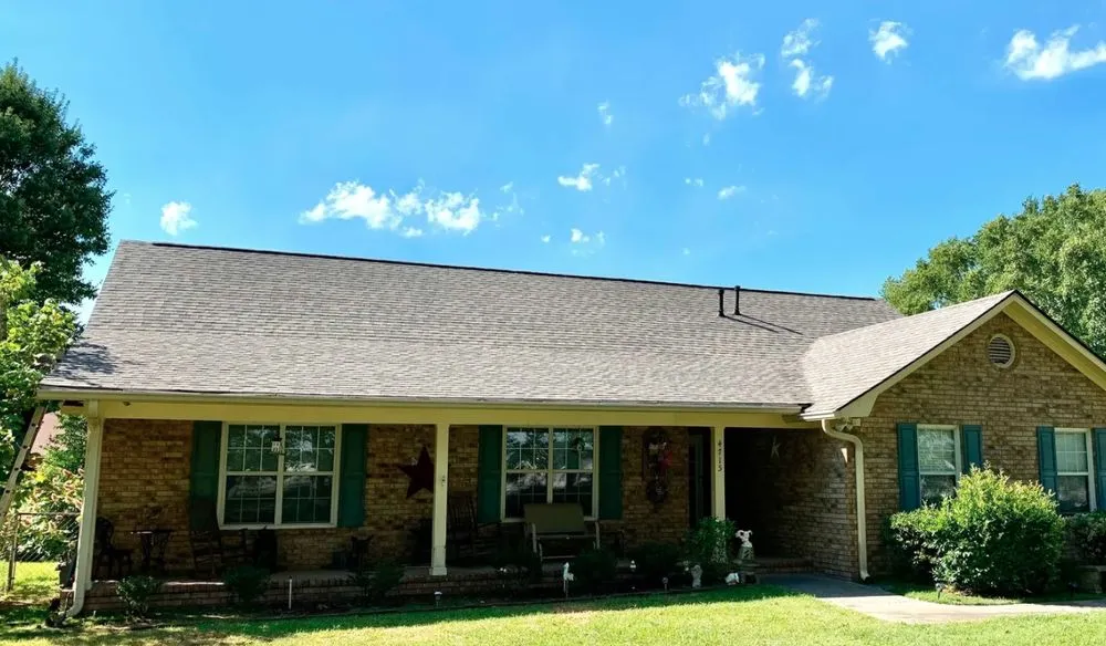 Slide of Gunn Roofing