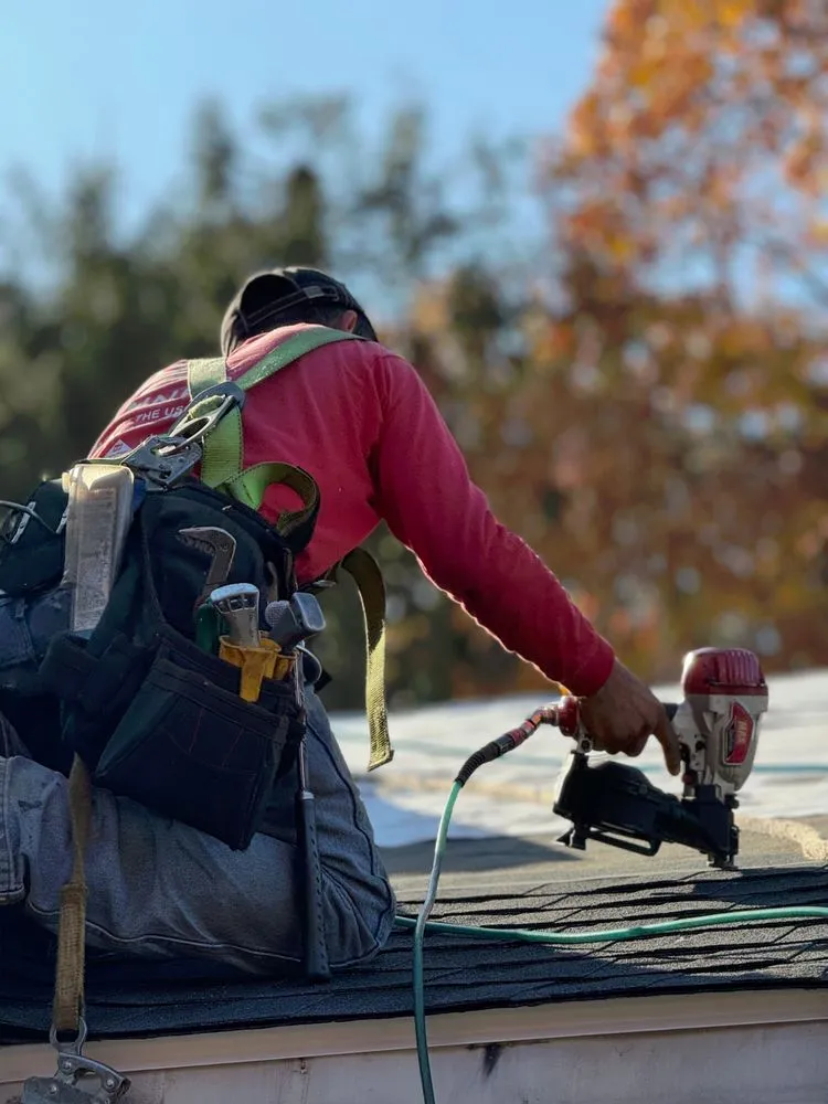 Slide of Gunner Roofing