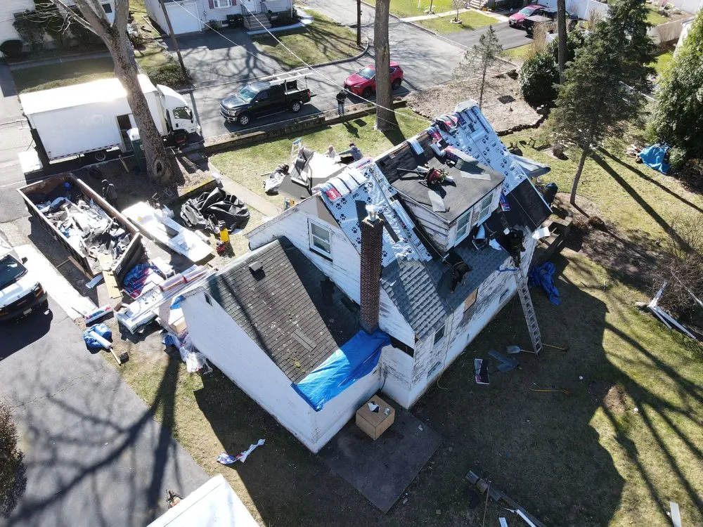 Slide of Gunner Roofing