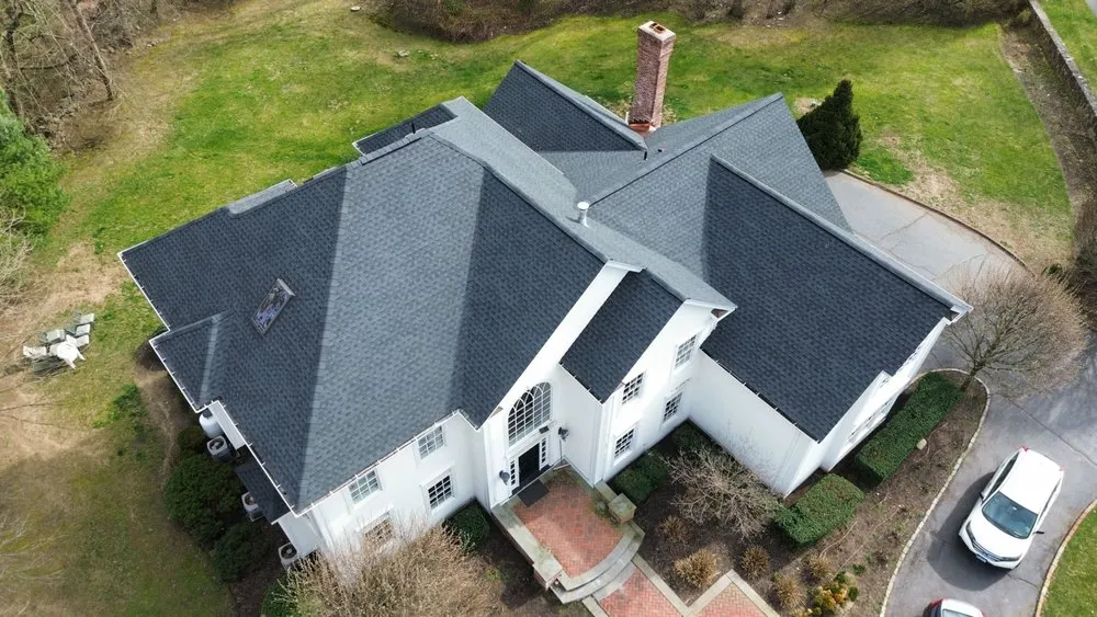 Slide of Gunner Roofing