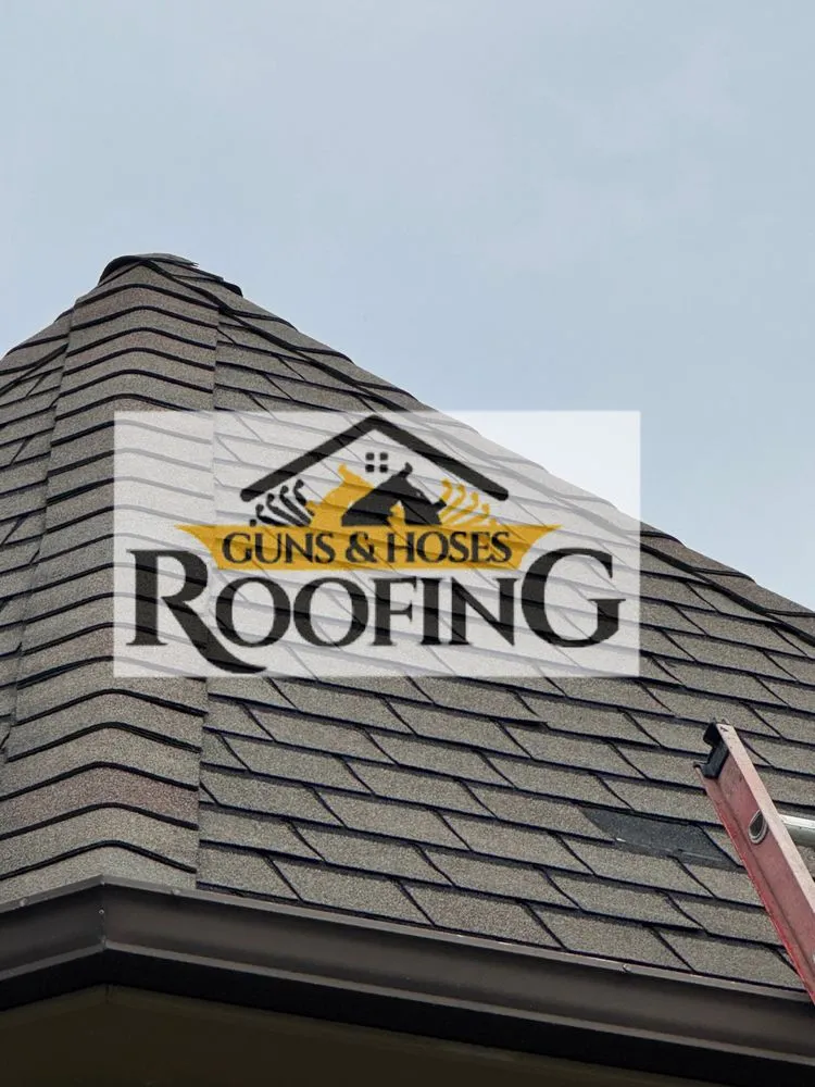 Slide of Guns & Hoses Roofing