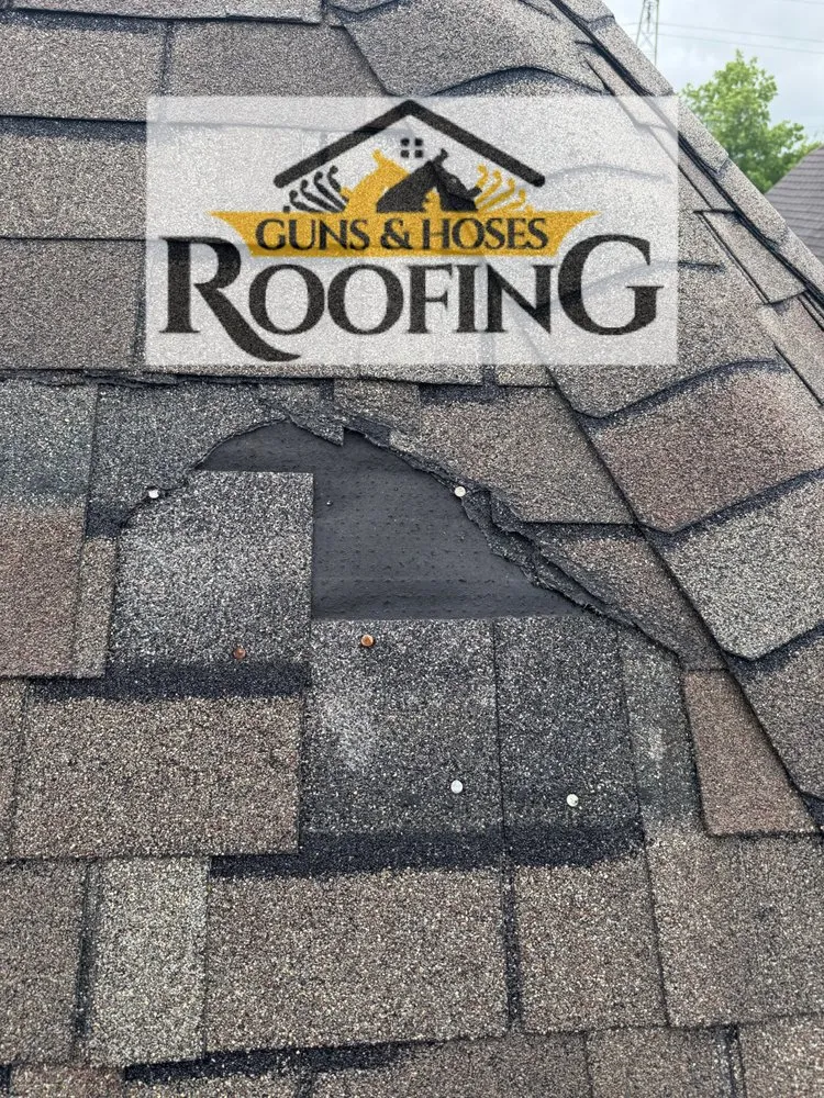 Slide of Guns & Hoses Roofing