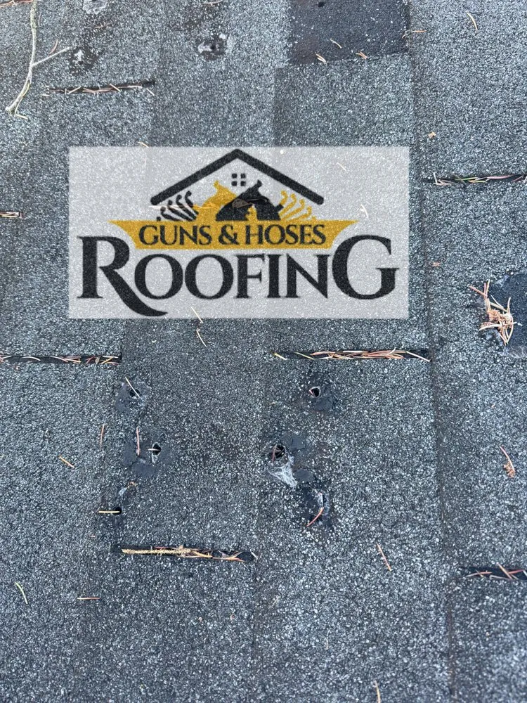 Slide of Guns & Hoses Roofing