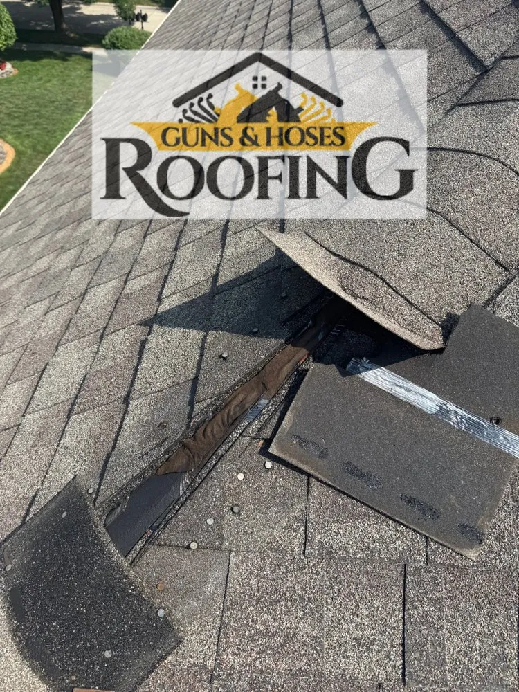 Slide of Guns & Hoses Roofing