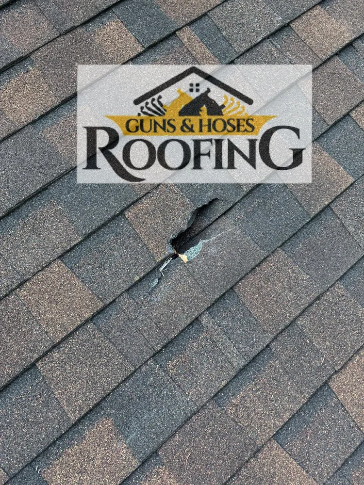 Slide of Guns & Hoses Roofing