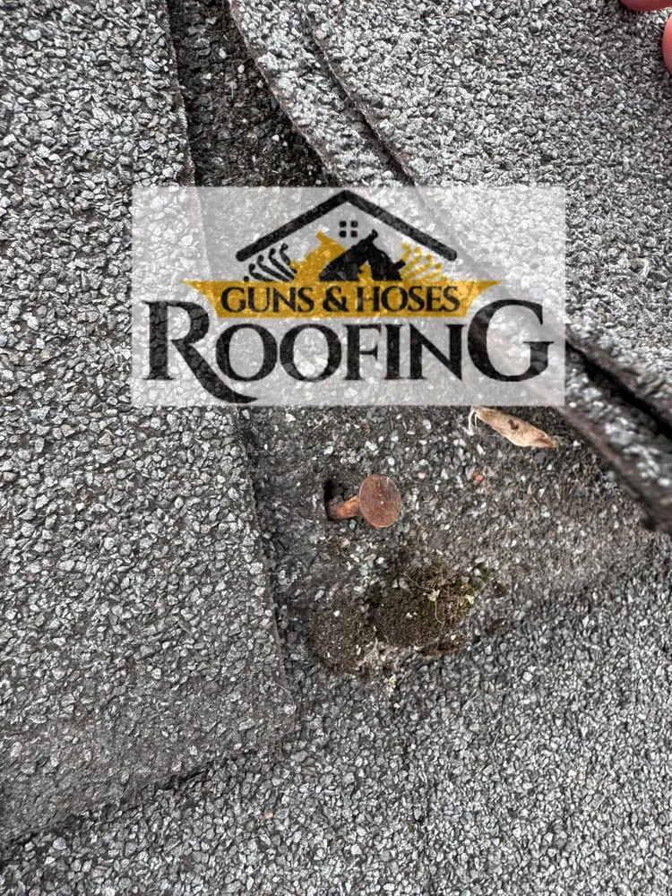 Slide of Guns & Hoses Roofing